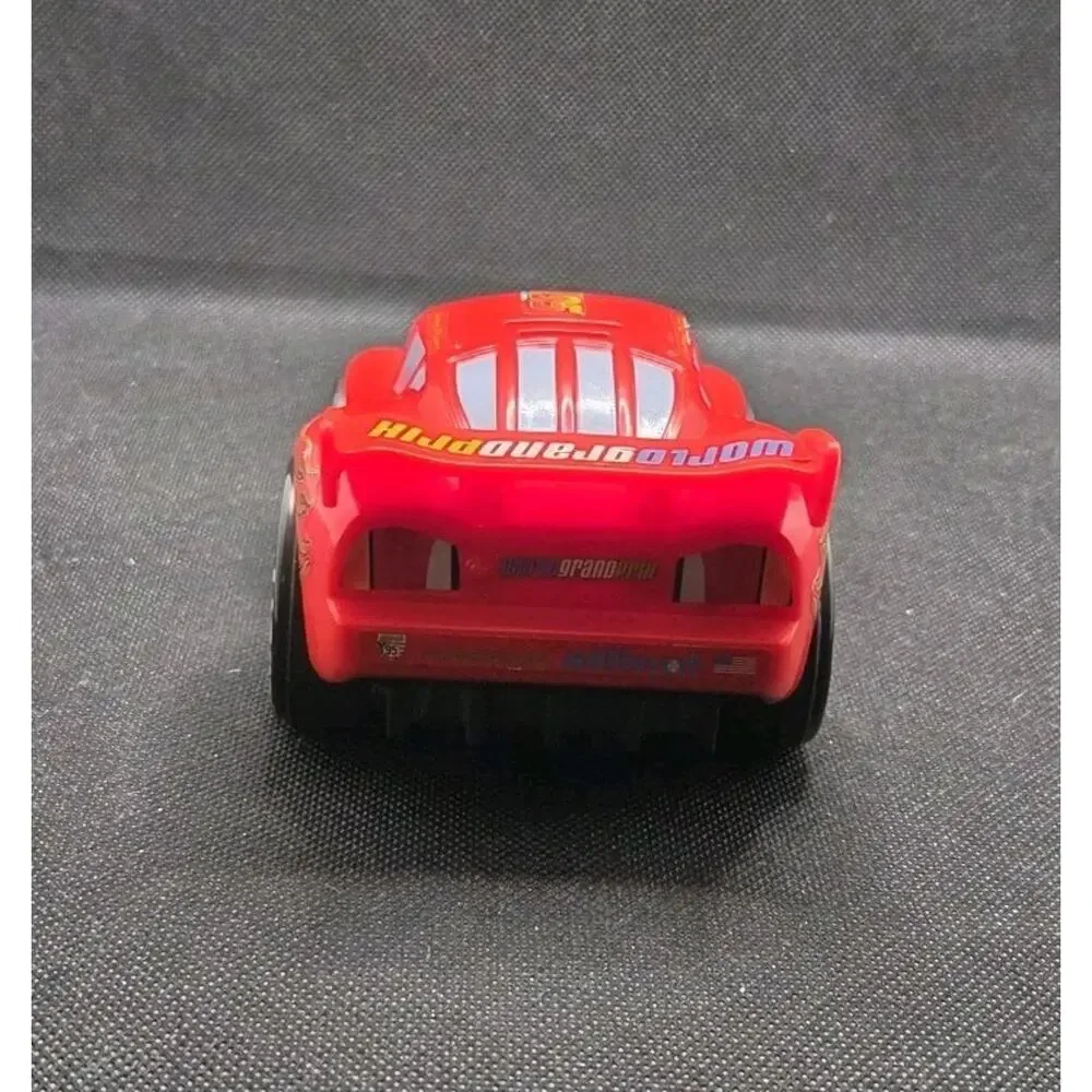 Disney Pixar Cars 2 Shake N Go Lightning McQueen World Grand Prix Talking Moving